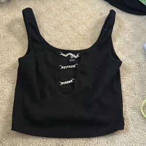 black crop top with chains across the middle (good concert top)